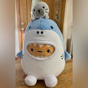 Blue and White Shark Plush Toy with Seal on top